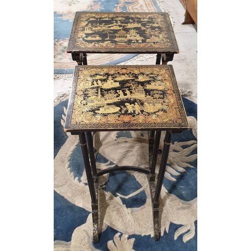 276 - A nest of two chinoiserie tables, the tallest height 27