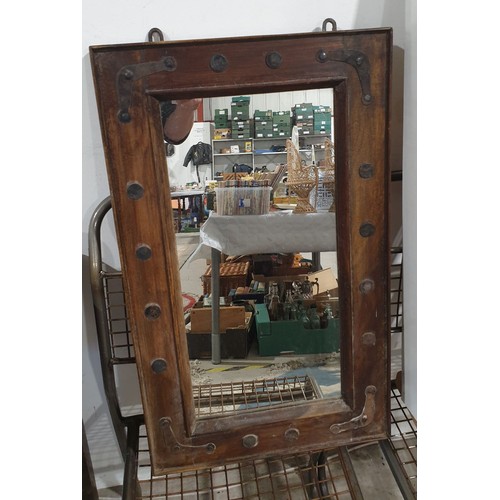 280 - A rustic wall mirror, overall length 28.25