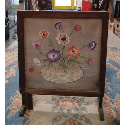 283 - A folding fire screen table with needlework insert, the top 19