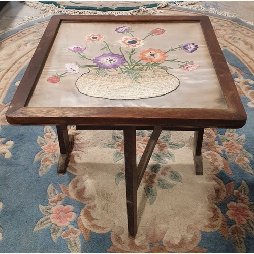 283 - A folding fire screen table with needlework insert, the top 19