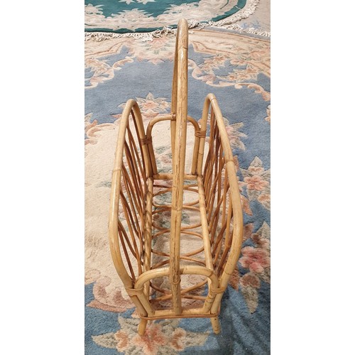 284 - A retro cane work magazine rack. No Shipping. Arrange collection or your own packer and shipper, ple... 