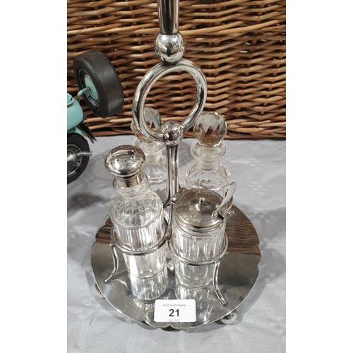 21 - An antique Mappin and Webb silver plated epergne cruet set, height 16.5