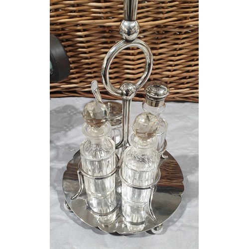 21 - An antique Mappin and Webb silver plated epergne cruet set, height 16.5