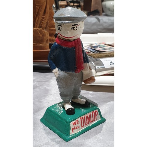 40 - A cast iron Dunlop golfing figure, height 5.5