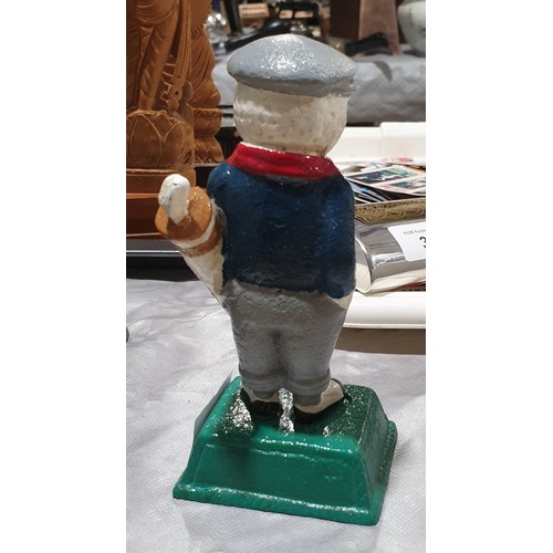 40 - A cast iron Dunlop golfing figure, height 5.5