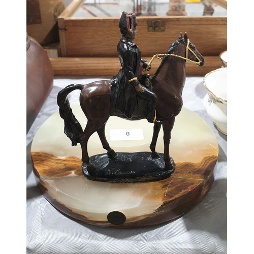 8 - An onyx ashtray with cold painted bronze figure of Napoleon on horseback, height 6.5