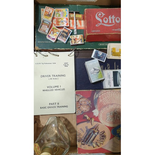 16 - A box including vintage games and a vintage Dimple whiskey bottle. No shipping. Arrange collection o... 