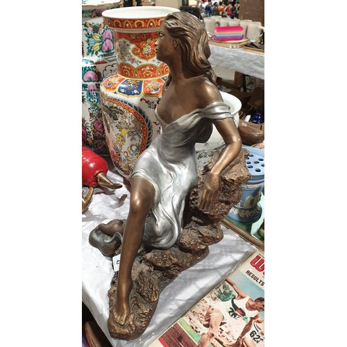 43 - A resin figure of a lady, height 16