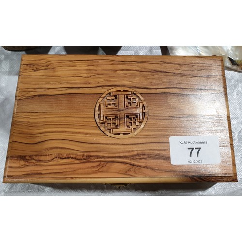 77 - A carved wooden box, width 7