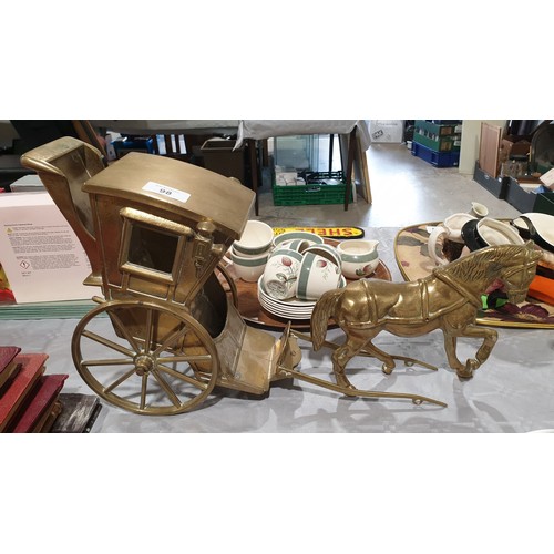 98 - A brass model of a horse and buggy, length 19