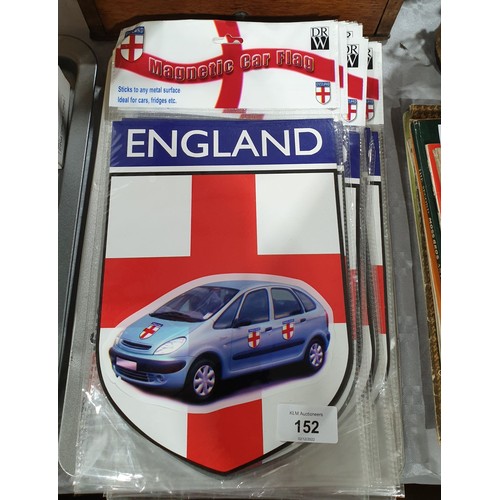 152 - Twelve new in packet England magnetic car flags together with an England fan set. UK shipping £14.