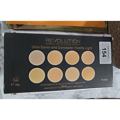 154 - Sealed Revolution Kisu make-up set and two others. UK shipping £14.