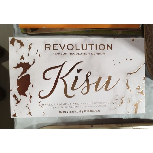 154 - Sealed Revolution Kisu make-up set and two others. UK shipping £14.