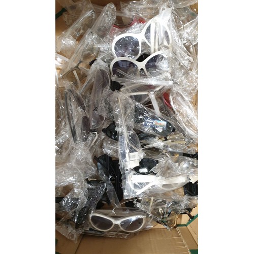 160 - A box of new in packet sunglasses. UK shipping £14.