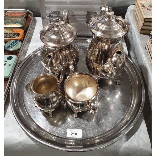 210 - A four piece silver plated tea set. UK shipping £14.