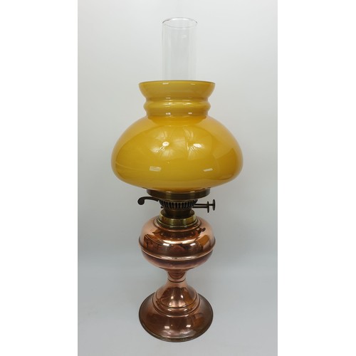 239 - A Britannia vintage oil lamp, height 18.5