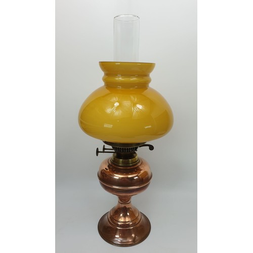 239 - A Britannia vintage oil lamp, height 18.5