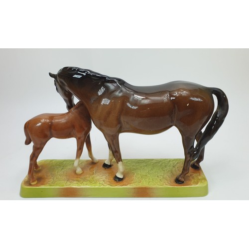 242 - A Beswick model of a horse and foal, 1811, length 10