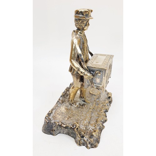 243 - An antique silver plate ink stand in the form of an organ grinder, height 6.75