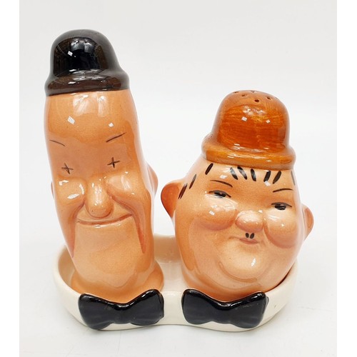 246 - A Beswick Laurel and Hardy salt and pepper set 575. UK shipping £14.