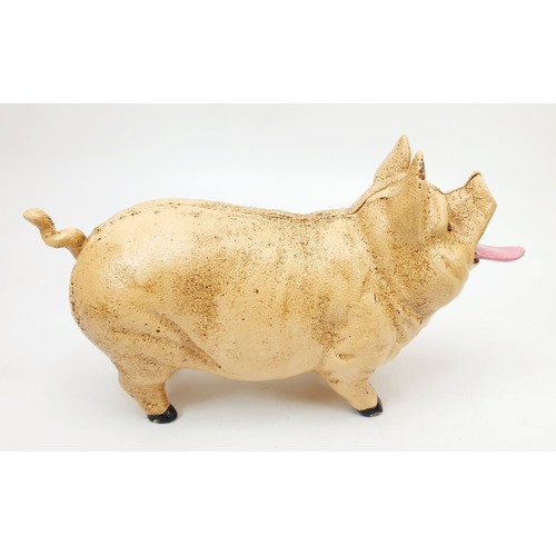 248 - A cast iron pig money box, length 8.25