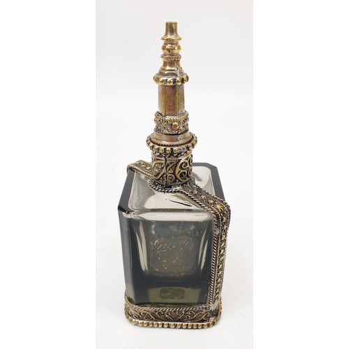 251 - A vintage Gucci perfume bottle, height 5.5