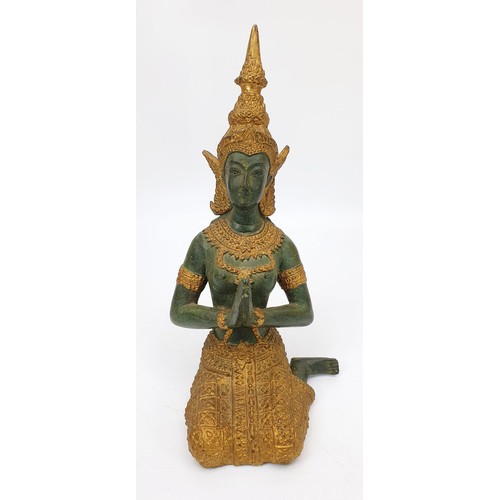 252 - A metal figure of an eastern deity, height 7.75