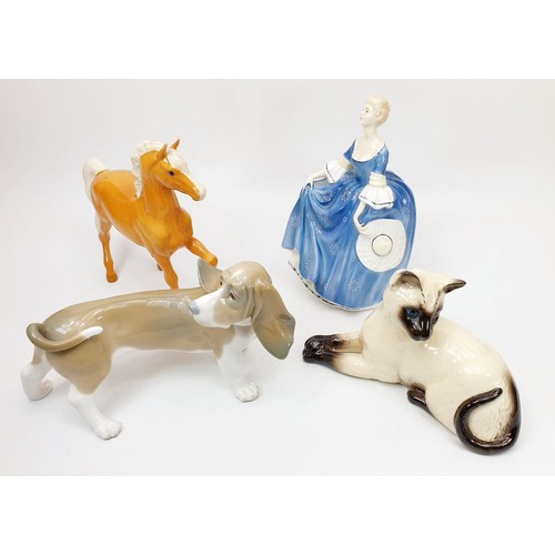 258 - A Lladro figure of a dachshund, a Beswick model of a horse, a Royal Doulton model of a cat and a Roy... 