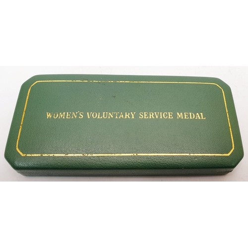 349 - A boxed Women's Voluntary Service medal. UK shipping £14.