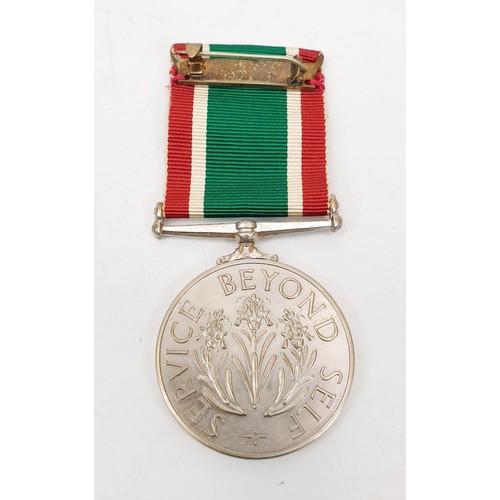 349 - A boxed Women's Voluntary Service medal. UK shipping £14.