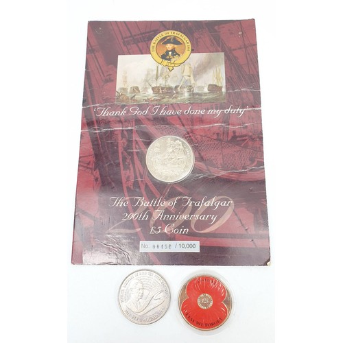 353 - A Prince's Trust £5 coin, a Battle of Trafalgar £5 coin and commemorative crowns together with a cas... 