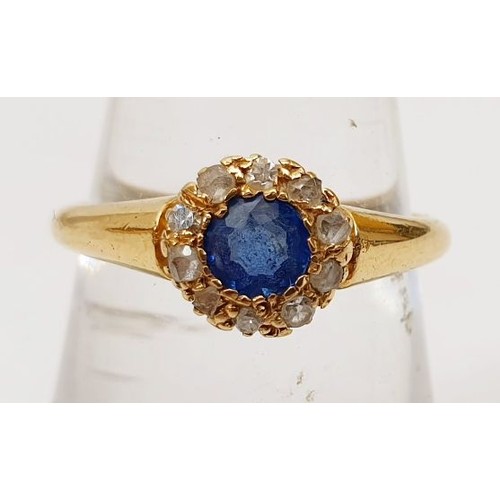 368 - A hallmarked 18ct gold sapphire and diamond cluster ring, size L/M weight 2.7g. UK shipping £14.