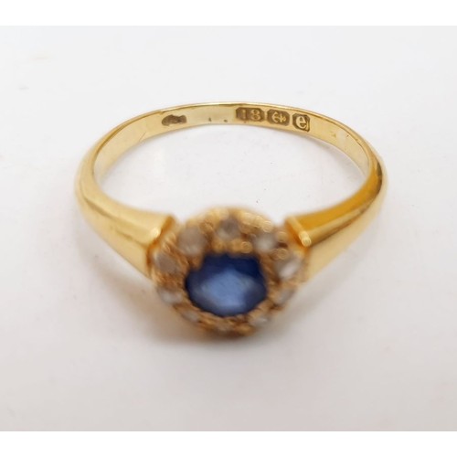 368 - A hallmarked 18ct gold sapphire and diamond cluster ring, size L/M weight 2.7g. UK shipping £14.