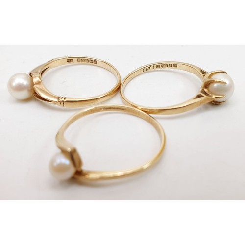 373 - Three hallmarked 9ct gold rings each set with a pearl, sizes N & M/N, total weight 4.1g. Uk shipping... 