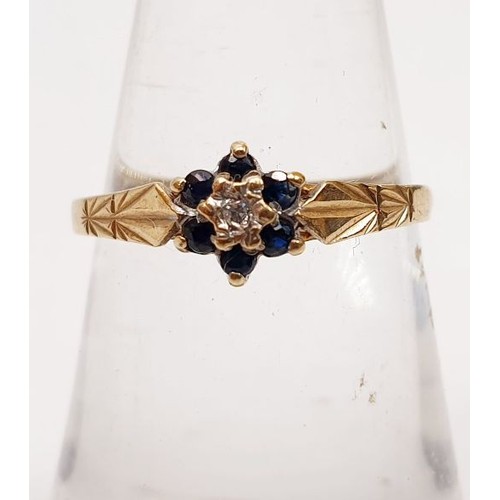 375 - A hallmarked 9ct gold diamond and sapphire cluster ring, size K, weight 0.9g. UK shipping £14.