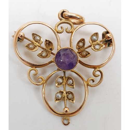 377 - An Edwardian yellow metal brooch/pendant set with an amethyst and seed pearls, A/F, weight 2.4g. UK ... 