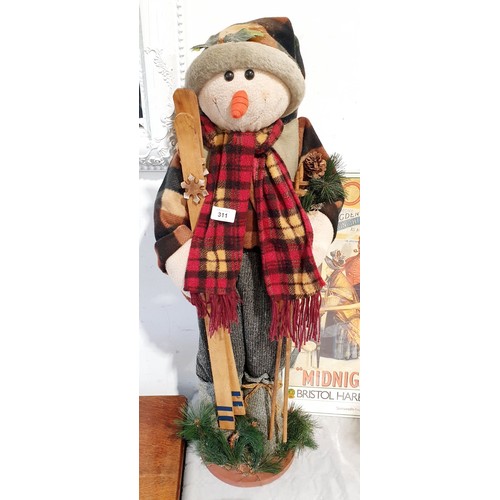 311 - A snowman ornament, height 33