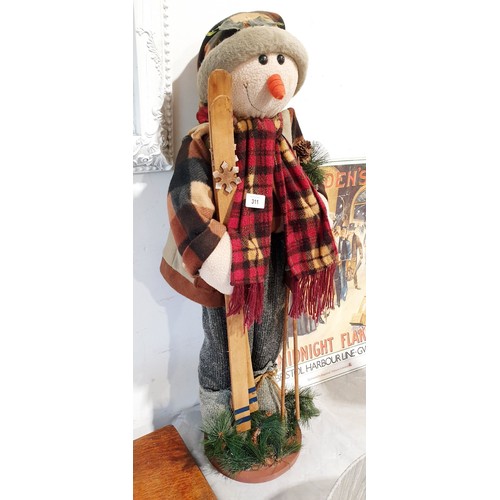 311 - A snowman ornament, height 33