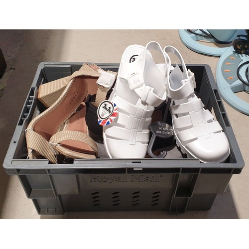 389 - A box of new ladies shoes. UK shipping £14.