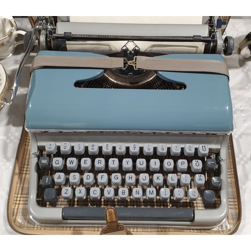 413 - A vintage Bluebird typewriter. No shipping.  Arrange collection or your own packer and shipper, plea... 