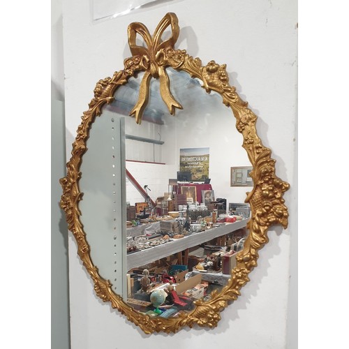 454 - A metal gilt framed mirror, length 22