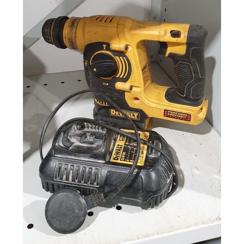 462 - A Dewalt cordless hammer drill with charger. No shipping. Arrange collection or your own packer and ... 