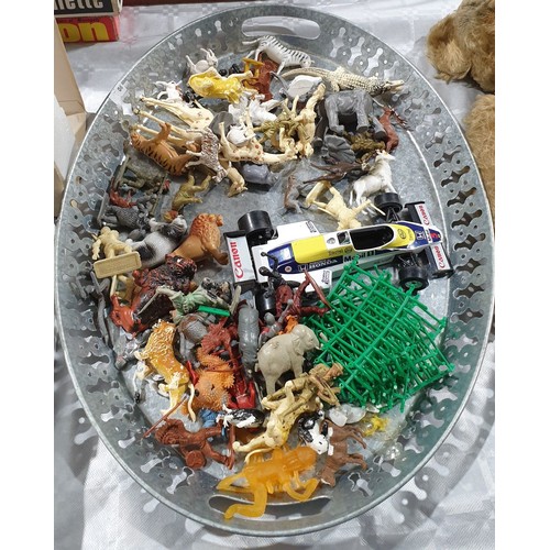 525 - A tray of toy animals and a racing car. UK shipping £14.