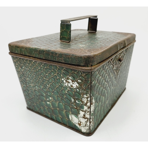 267A - An antique Huntley & Palmers Morocco green biscuit tin with a faux crocodile skin pattern finish, c.... 