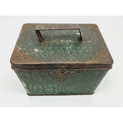 267A - An antique Huntley & Palmers Morocco green biscuit tin with a faux crocodile skin pattern finish, c.... 