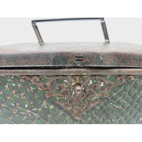 267A - An antique Huntley & Palmers Morocco green biscuit tin with a faux crocodile skin pattern finish, c.... 