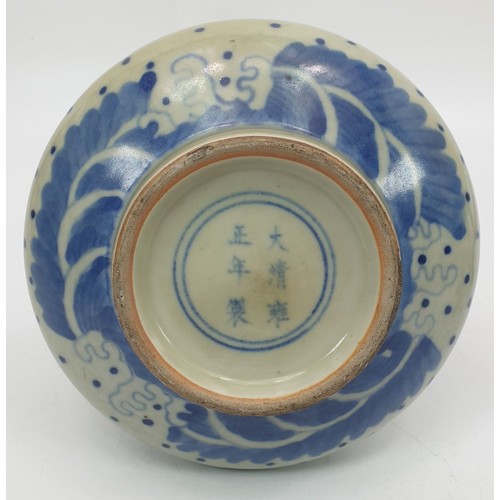 125 - A Chinese blue and white dragon vase having six character mark to the base, height 6