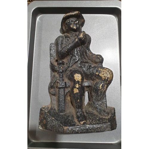 3 - An antique brass cast doorstop, length 9.5