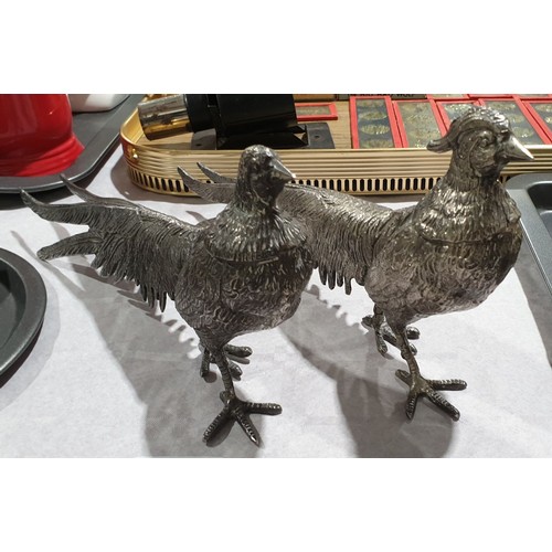 4 - A pair of silver plated pheasants, length 11.5