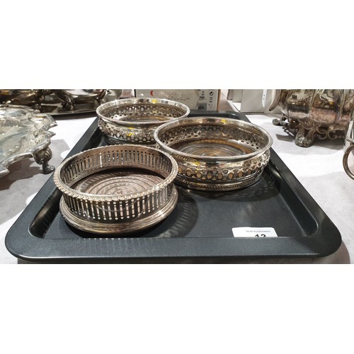 13 - Three wine bottle coasters, the largest diameter 5.75